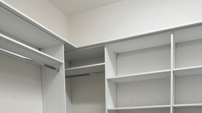 2-Primary Closet Left and Back Wall Photo