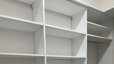 2-Primary Closet Back Wall Photo