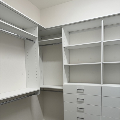 2-Primary Closet Left and Back Wall Photo