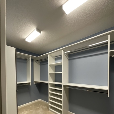 1-Primary Closet Back Wall Photo