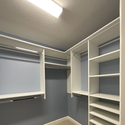 1-Primary Closet Back and Right Wall Photo